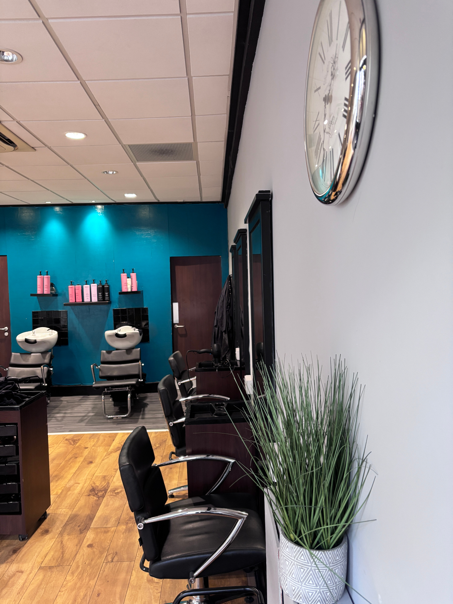 Styling chairs and shelving inside the salon